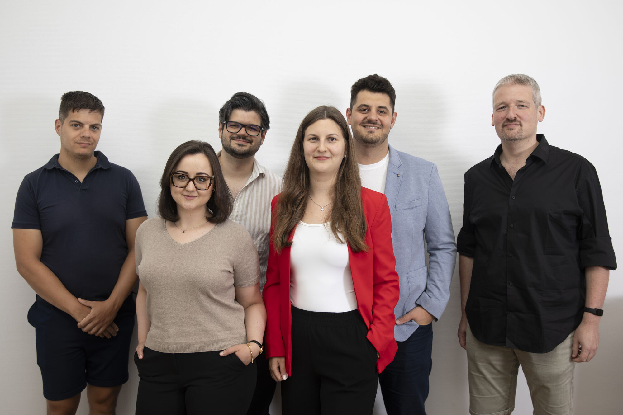 The KR Labs team standing together in the studio